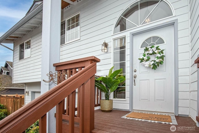 doorway to property with fence