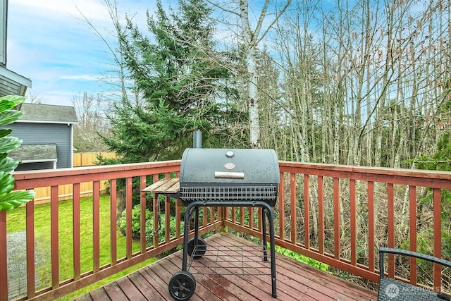 wooden terrace with area for grilling