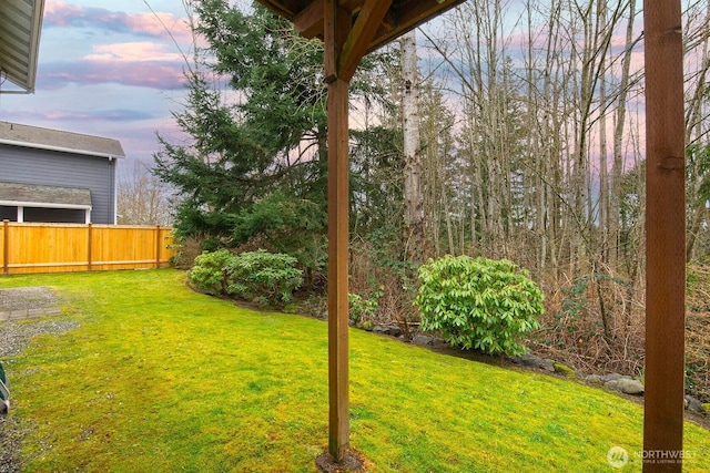 yard at dusk with fence