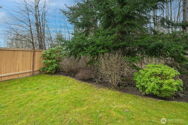 view of yard with fence