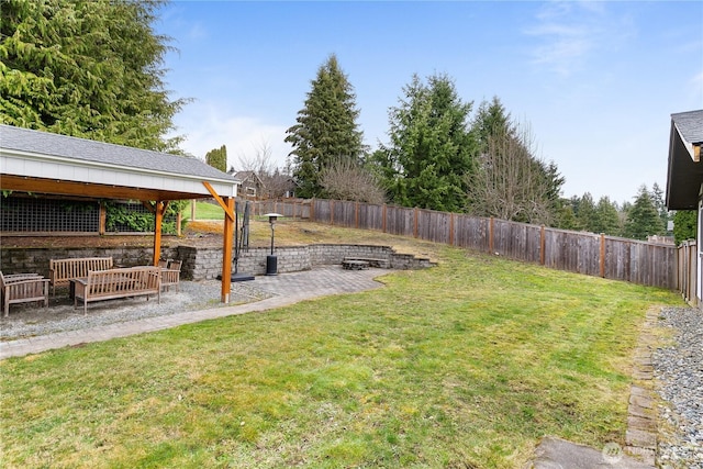 view of yard featuring a fenced backyard and a patio area