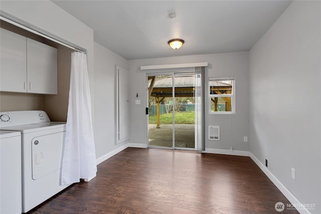 laundry room featuring washer and dryer, baseboards, and dark wood-style flooring