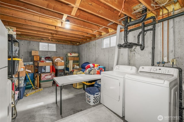 basement featuring separate washer and dryer