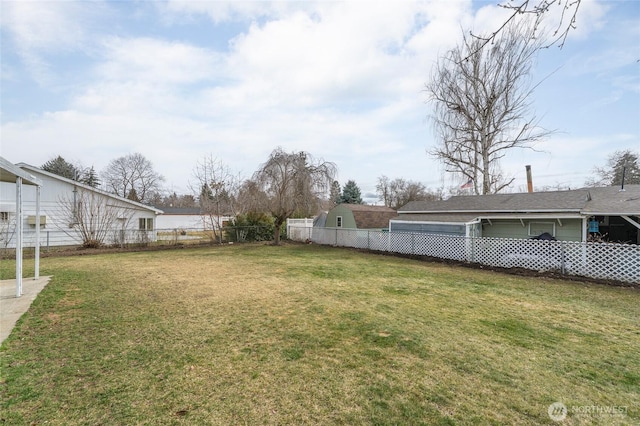 view of yard with fence