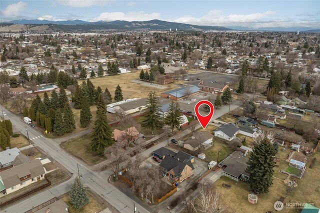 aerial view with a mountain view and a residential view