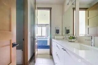 bathroom with tile patterned flooring