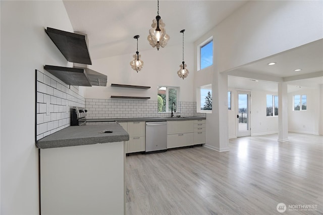 kitchen featuring dark countertops, dishwashing machine, electric stove, white cabinetry, and open shelves