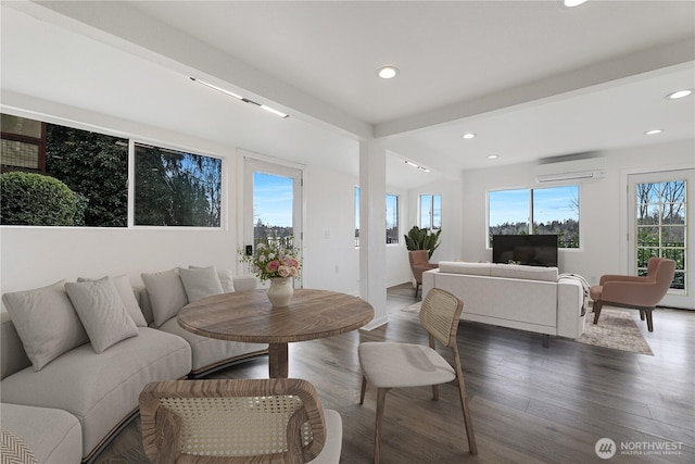 living room featuring beamed ceiling, recessed lighting, dark wood-style floors, and a wall mounted AC