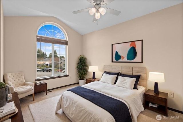 bedroom with ceiling fan, baseboards, lofted ceiling, and carpet floors