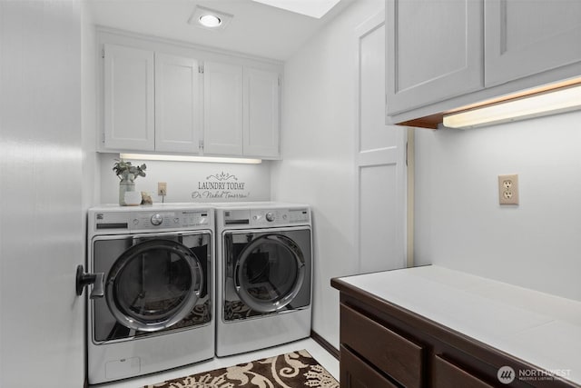 washroom featuring recessed lighting, cabinet space, and separate washer and dryer