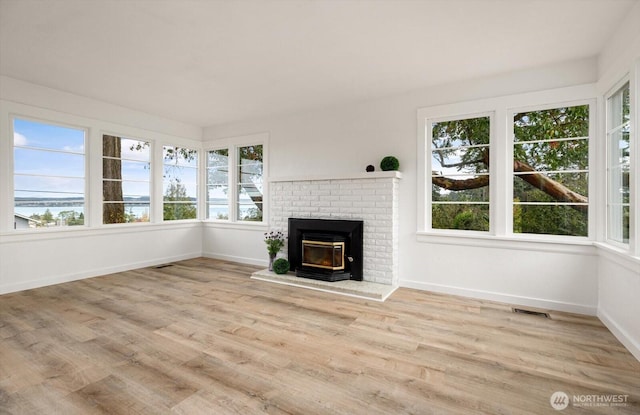 unfurnished sunroom with visible vents