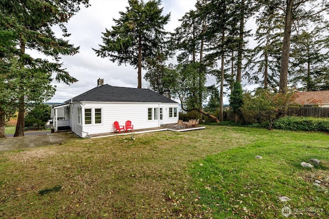 view of yard with a wooden deck and fence