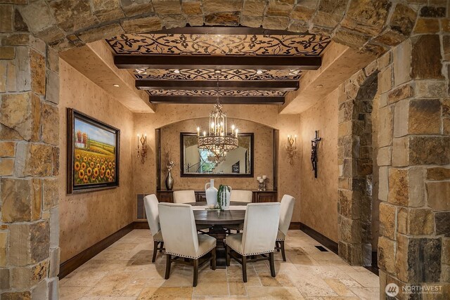 253 E Lake Sammamish Pkwy SE, Sammamish, WA 98074 - dining room featuring visible vents, baseboards, an inviting chandelier, beam ceiling, and stone tile floors