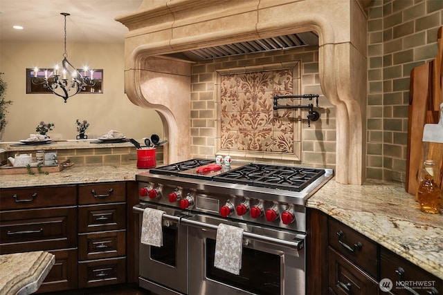 253 E Lake Sammamish Pkwy SE, Sammamish, WA 98074 - kitchen with dark brown cabinetry, a notable chandelier, light stone countertops, decorative backsplash, and double oven range