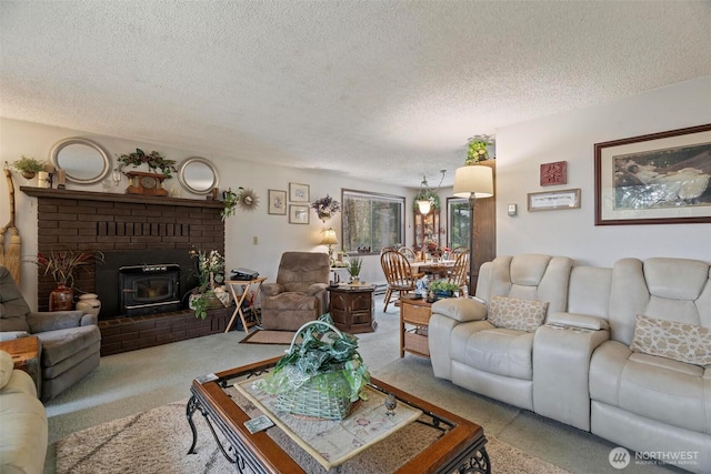 carpeted living room with a textured ceiling