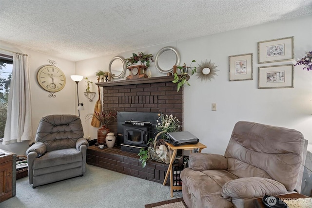 living area featuring a wood stove, carpet floors, and a textured ceiling