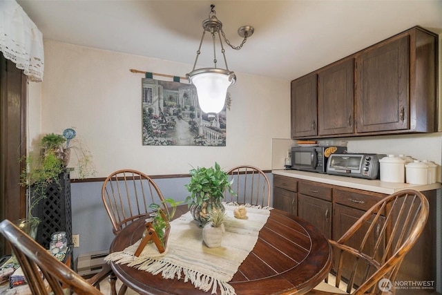 dining area featuring a toaster