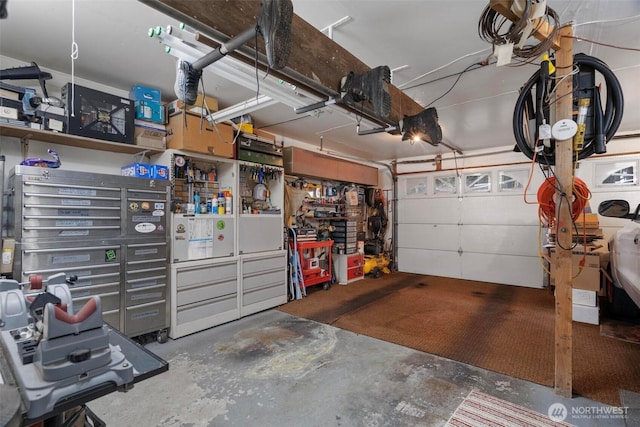 garage with a workshop area