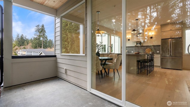 view of patio featuring a balcony