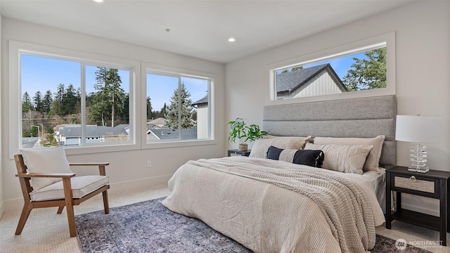 bedroom featuring recessed lighting, baseboards, and carpet floors