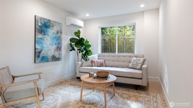 living area featuring recessed lighting, baseboards, a wall unit AC, and wood finished floors