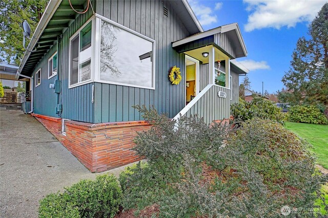 view of front facade featuring board and batten siding