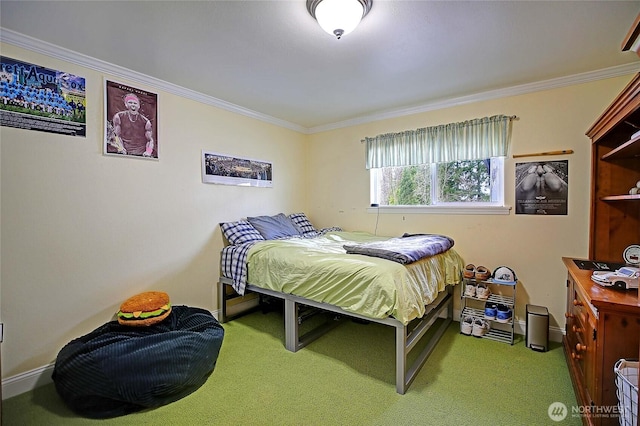 bedroom featuring carpet floors, ornamental molding, and baseboards