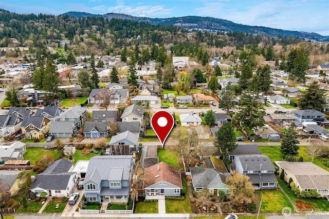 drone / aerial view with a residential view and a mountain view