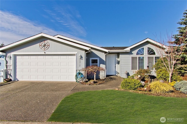 single story home featuring driveway, a front yard, and a garage