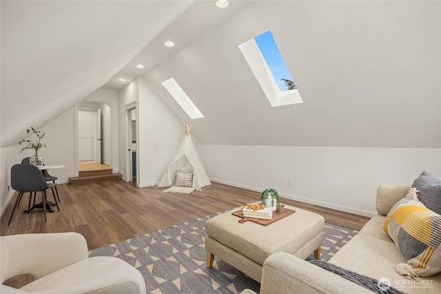 living room featuring baseboards, recessed lighting, wood finished floors, and lofted ceiling with skylight