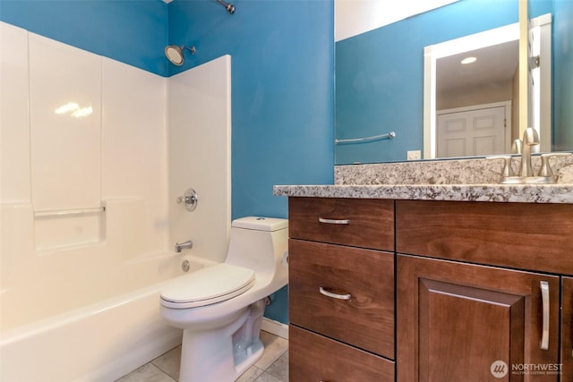 bathroom with tile patterned floors, shower / bathing tub combination, toilet, and vanity