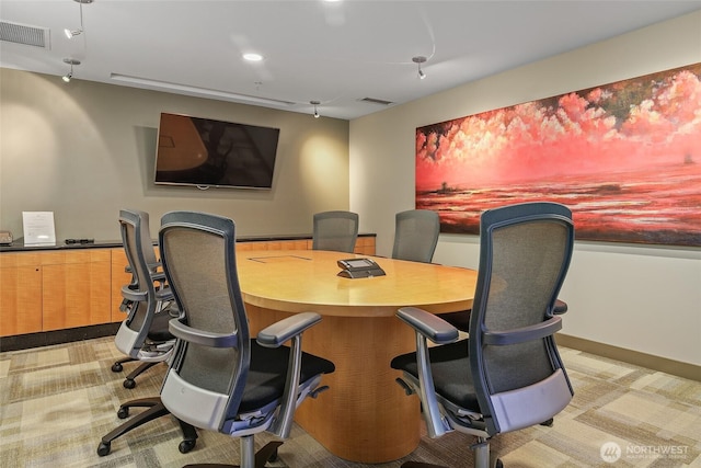 office space featuring light colored carpet and visible vents