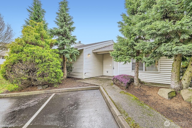 view of front of property featuring uncovered parking