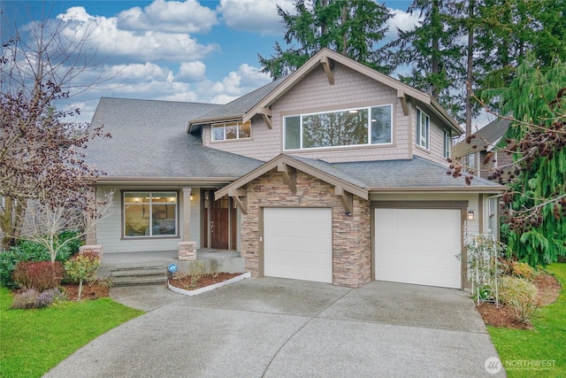 craftsman-style home with stone siding, concrete driveway, an attached garage, and a shingled roof