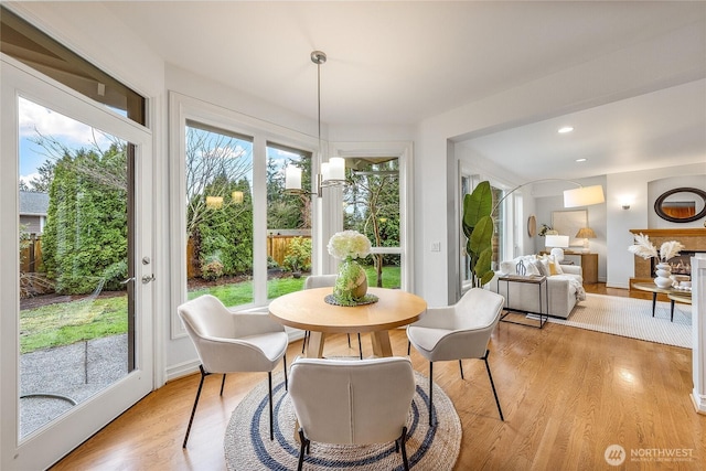 dining area with recessed lighting and light wood-type flooring