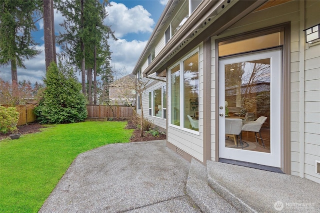 view of patio / terrace featuring fence