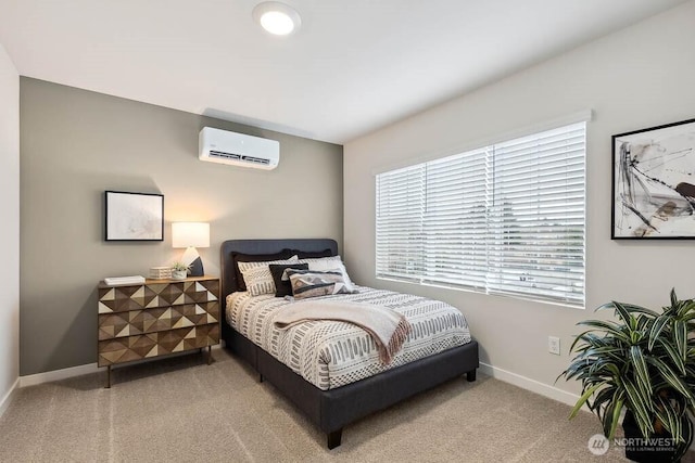 bedroom with light colored carpet, a wall mounted air conditioner, and baseboards