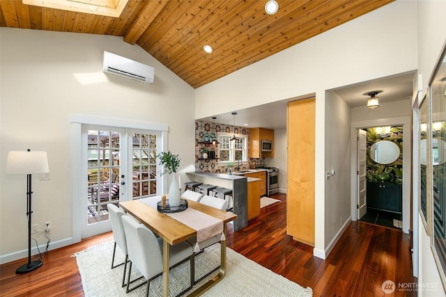 dining room with baseboards, a wall mounted AC, dark wood finished floors, a skylight, and french doors