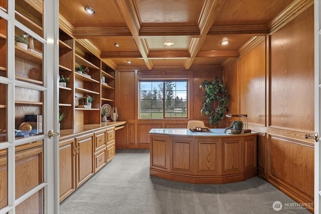 office featuring light colored carpet, wood ceiling, and wood walls