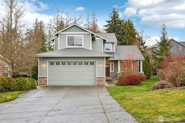 view of front of house with a front lawn, roof with shingles, driveway, stone siding, and an attached garage