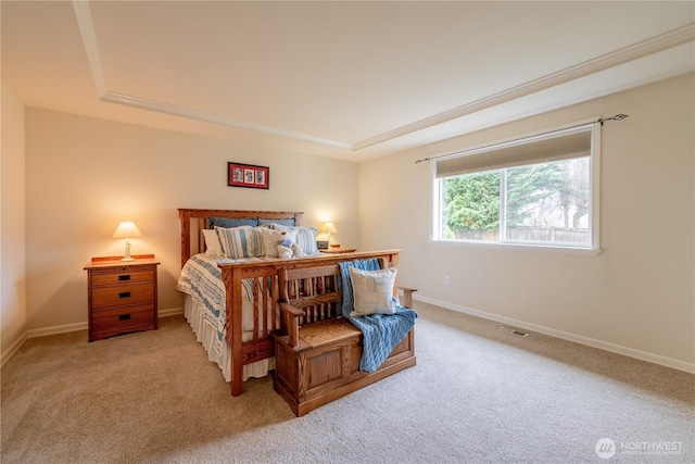 bedroom featuring baseboards and light colored carpet