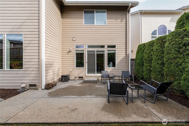 back of house featuring a patio area