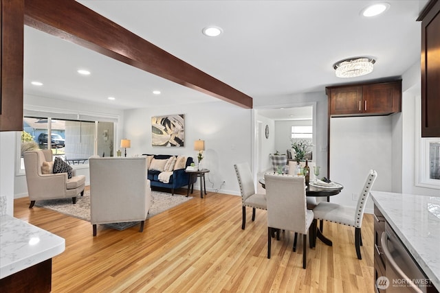 dining room with recessed lighting, beamed ceiling, baseboards, and light wood-style flooring