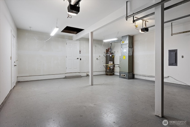 garage featuring electric panel, strapped water heater, heating unit, and a garage door opener