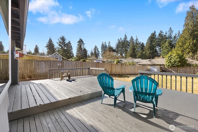 deck featuring a fenced backyard