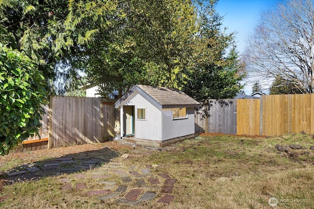 view of shed featuring a fenced backyard