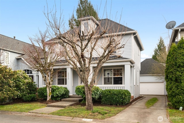 traditional style home with a garage, a porch, a shingled roof, and an outdoor structure