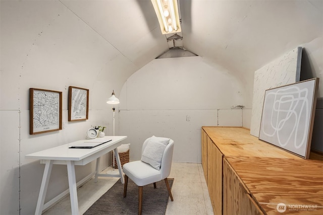 office space with vaulted ceiling