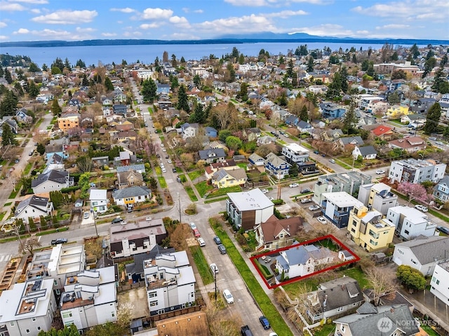 aerial view featuring a residential view and a water view