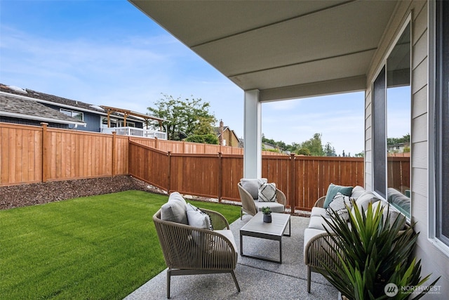 view of yard with a patio, outdoor lounge area, and a fenced backyard